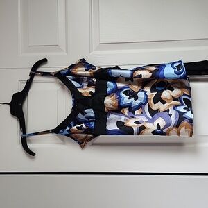 Dressy tank top blouse with stretchy back